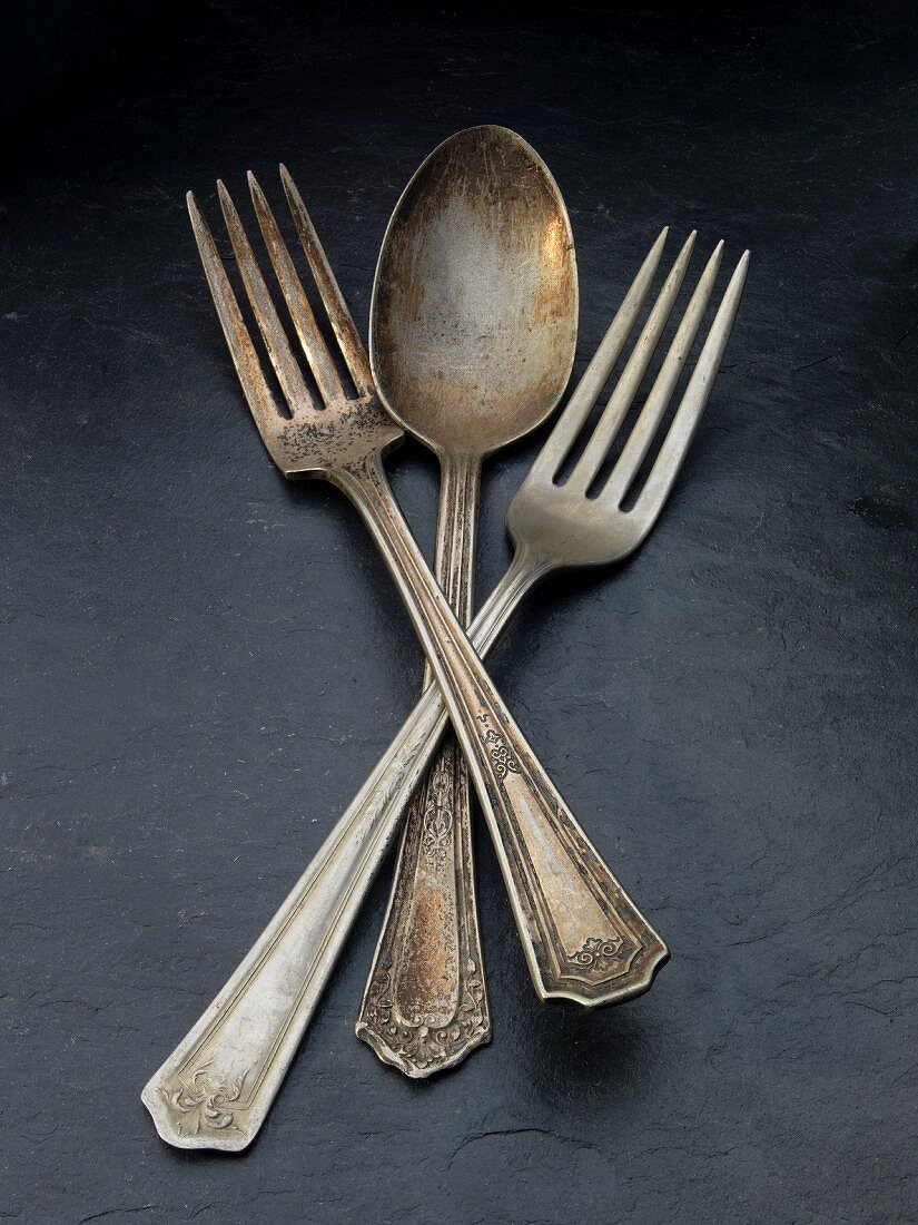 Old silver forks and a spoon
