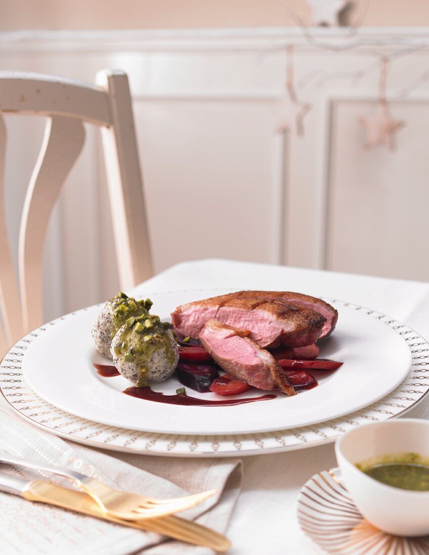 Duck breast with poppyseed dumplings