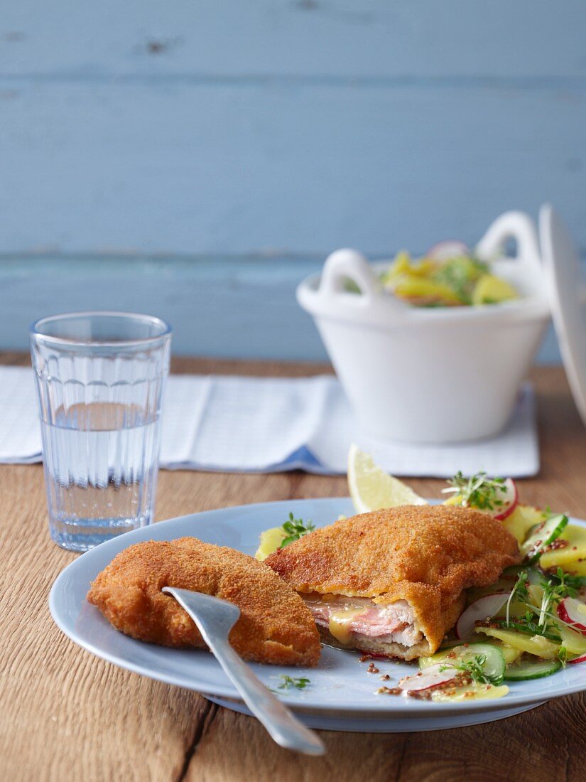 Cordon bleu with a potato and cucumber salad