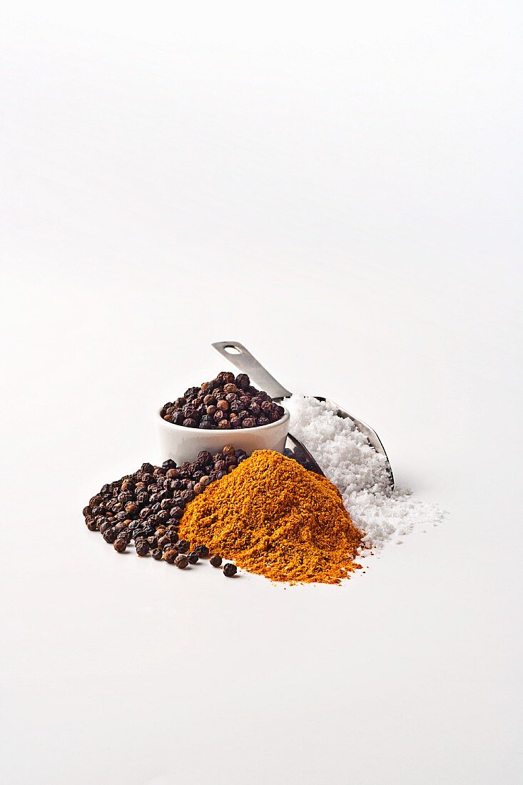 Various spices on a white surface