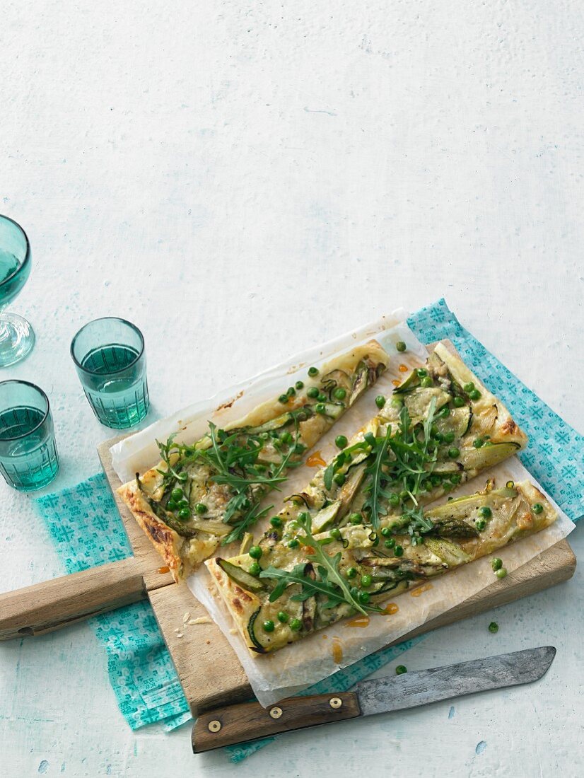 Puff pastry pizza with green vegetables