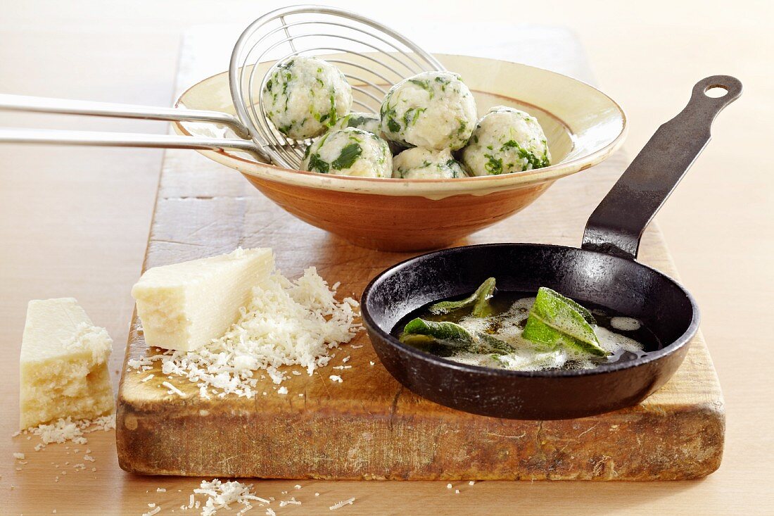 Spinach dumplings with sage butter and Parmesan cheese