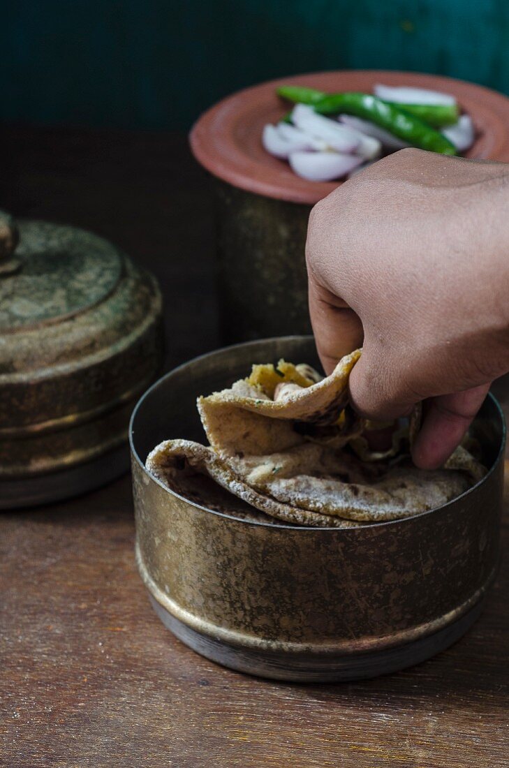 Paratha in a metal bowl (unleavened bread, India)