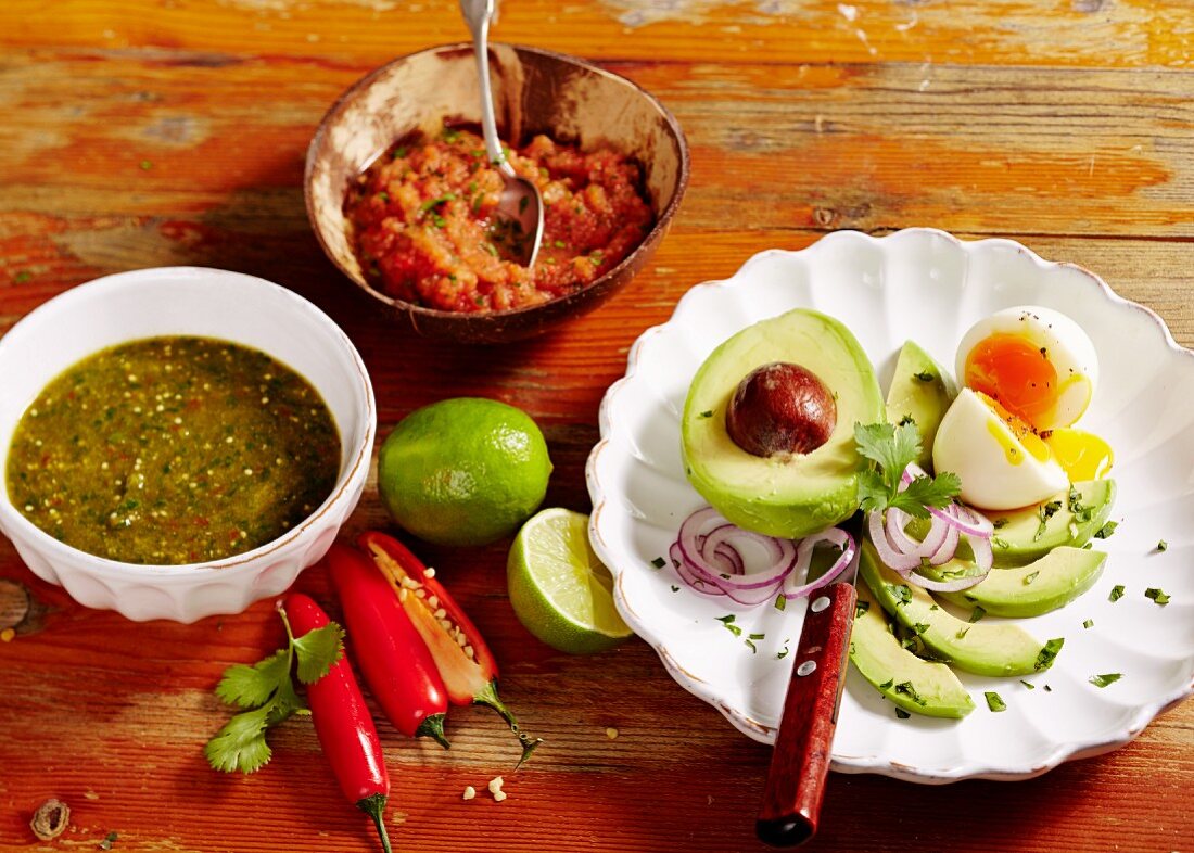 Avocado with red and green salsa