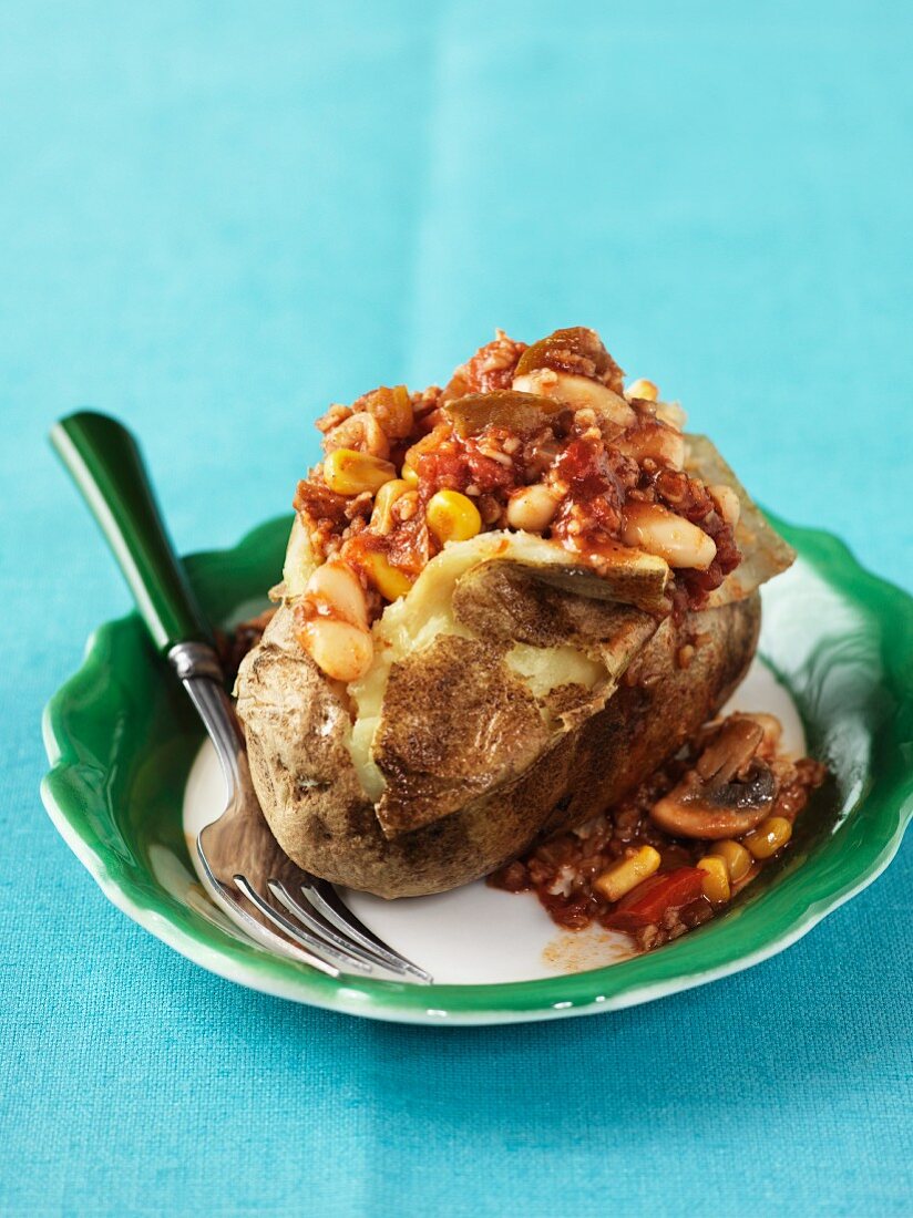 A baked potato filled with chilli