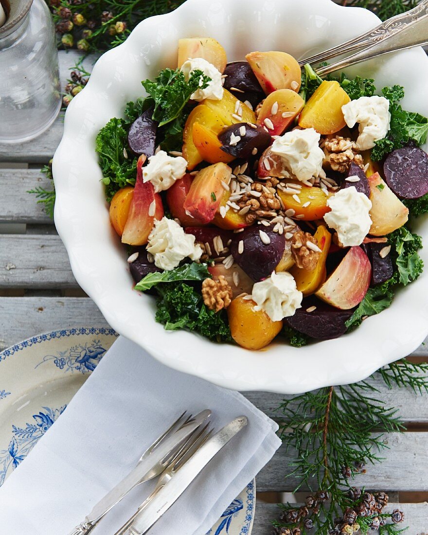 Beetroot salad with kale, cream cheese, walnuts and sunflower seeds