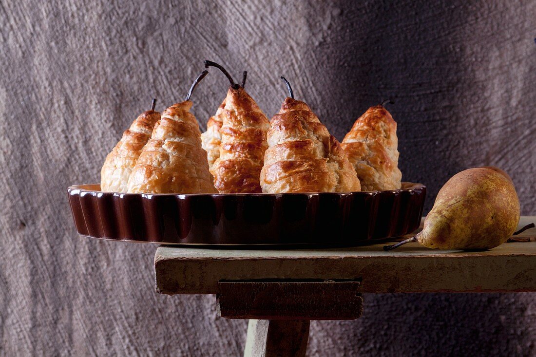 Pears wrapped in puff pastry filled with cheese and walnuts