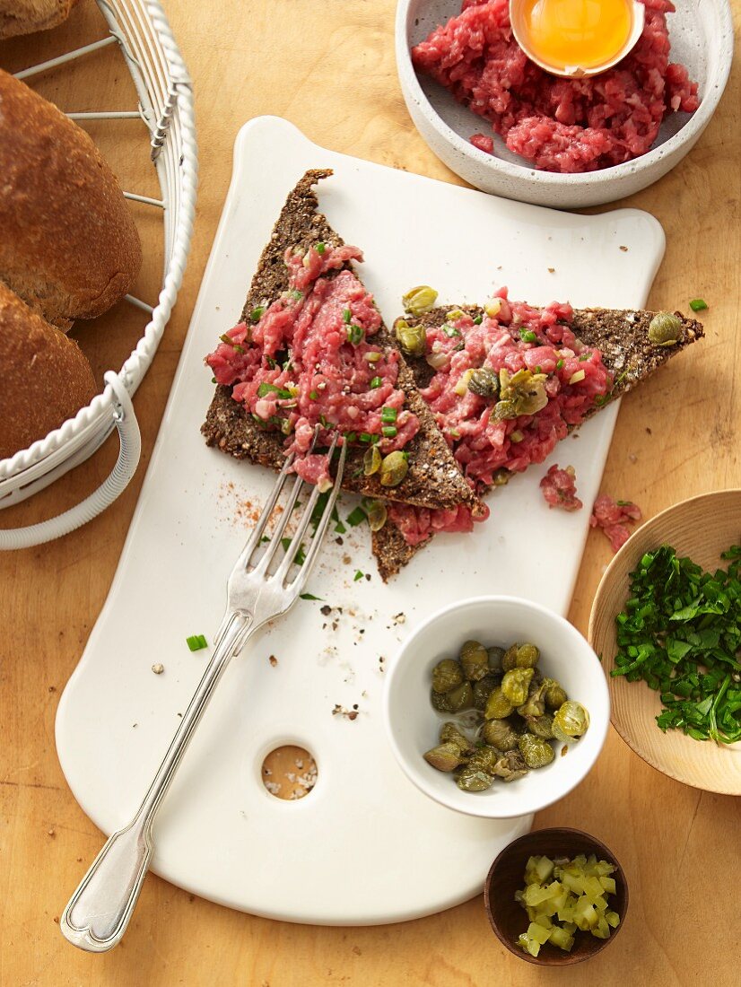 Beef tatar with capers on black bread