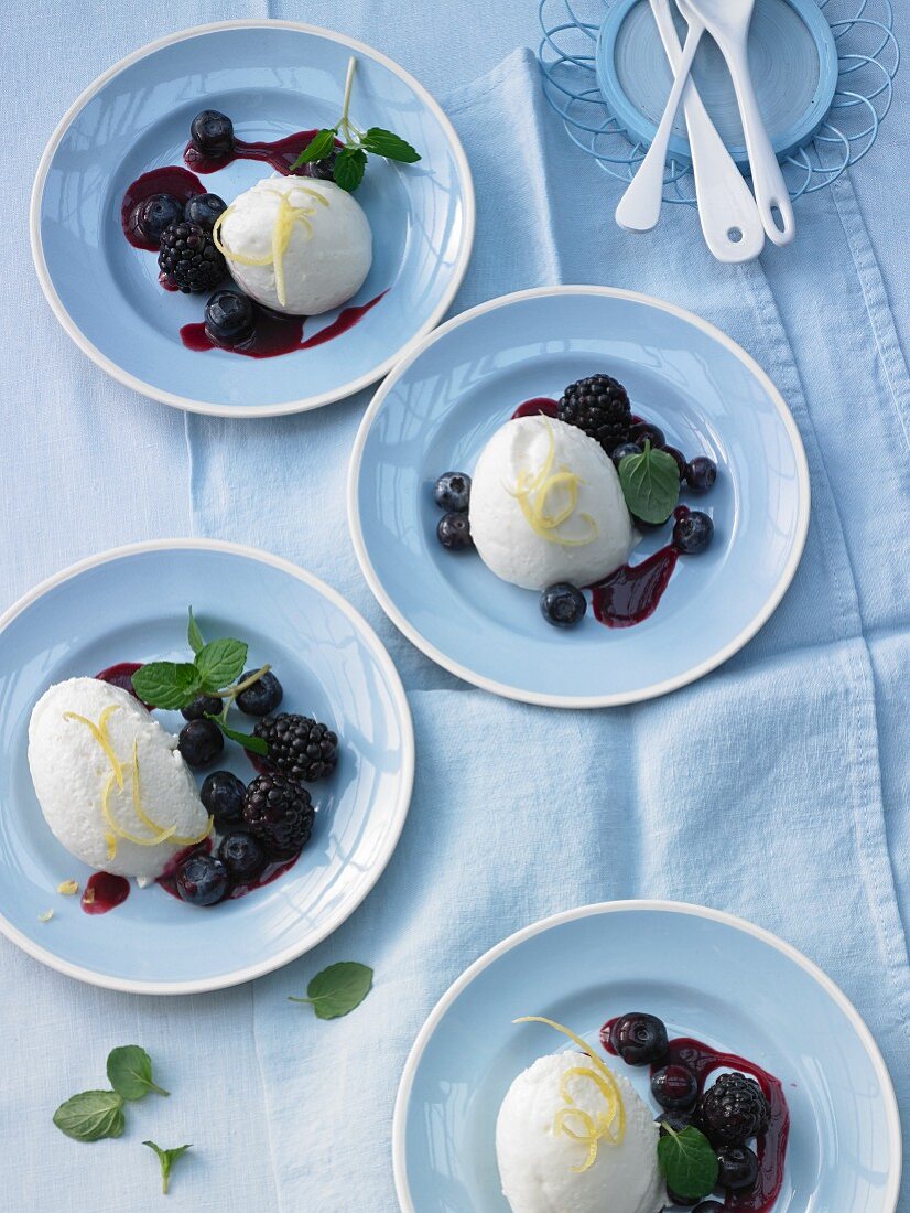 Lemon mousse with blackberries and blueberries