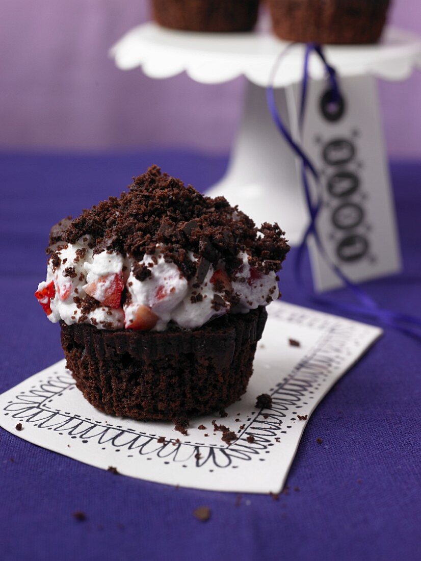 A molehill muffin with strawberry cream