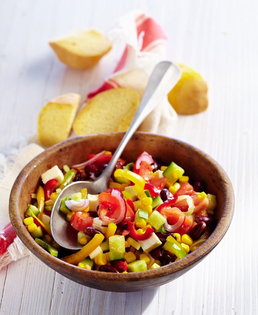 A Western salad with sweetcorn, kidney beans, peppers, tomatoes and feta cheese