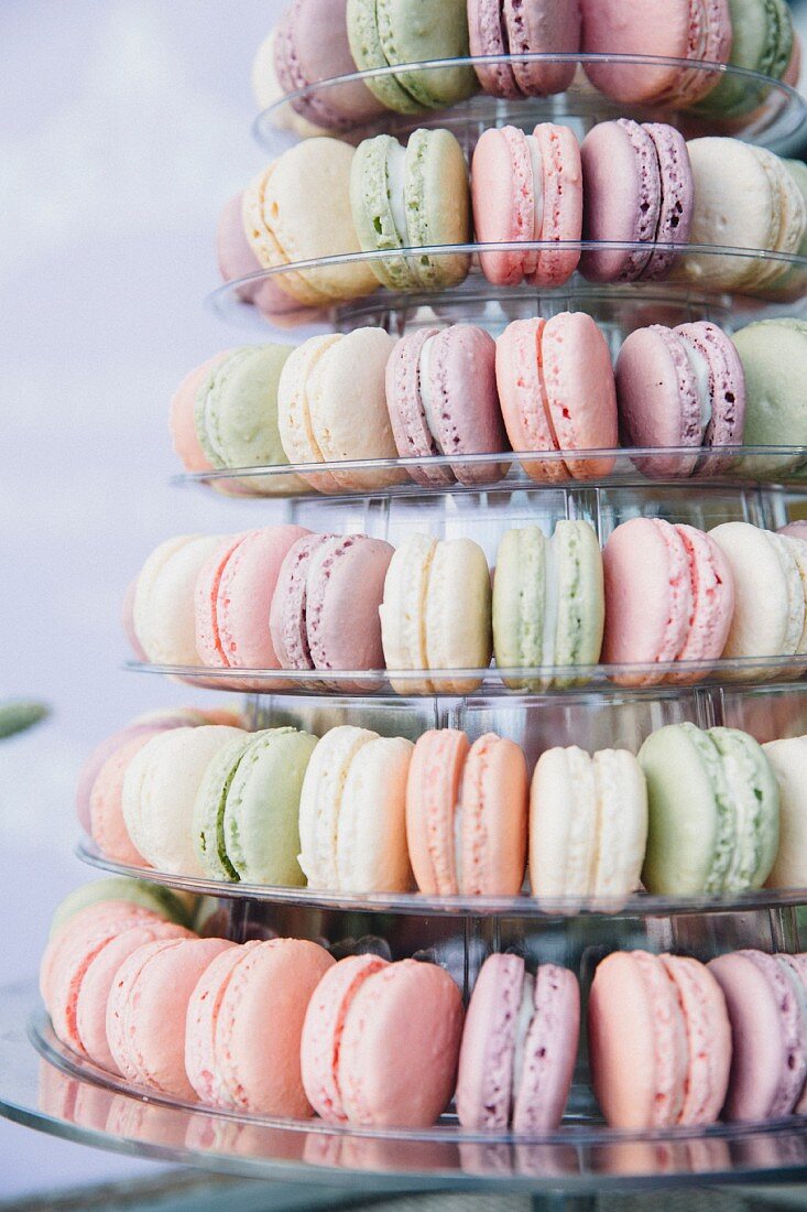 Pastel-coloured macaroons on a multi-tiered stand