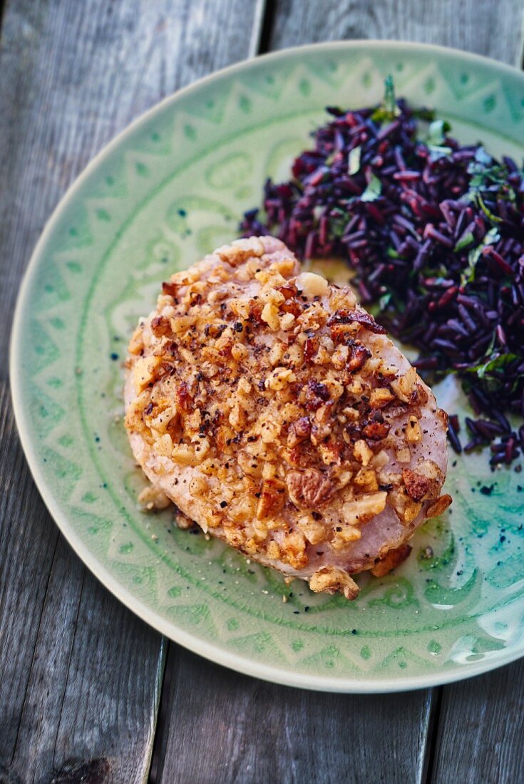 Swordfish with a nut crust and black rice