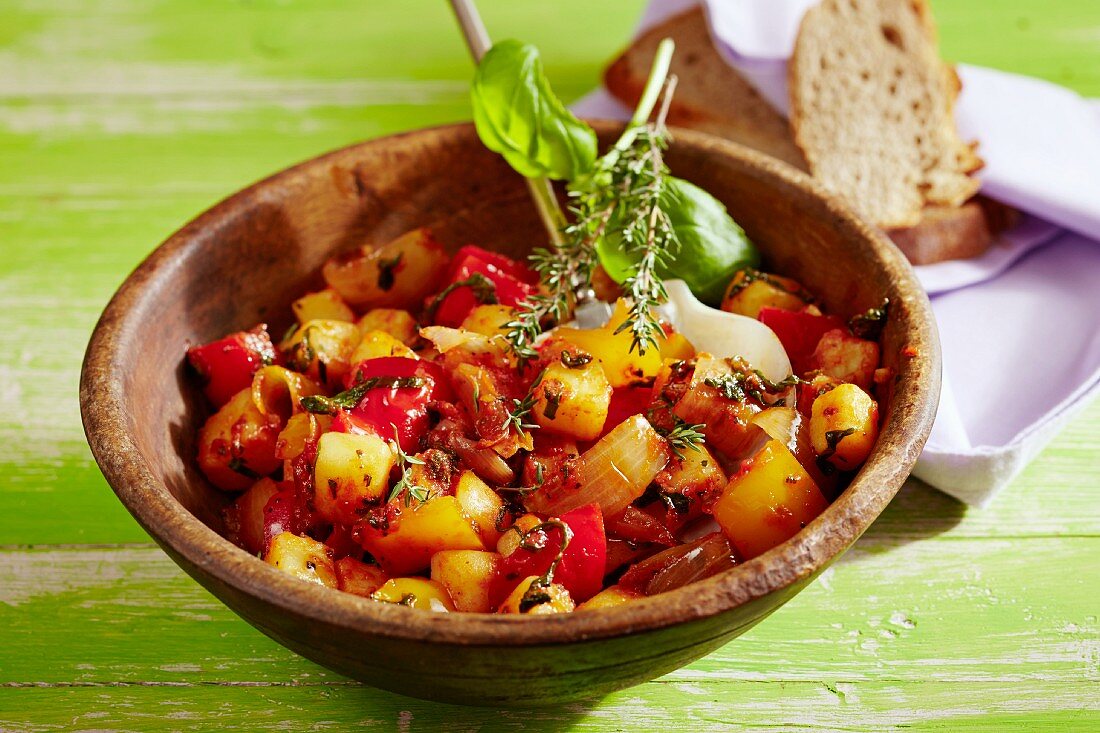 Warm vegetable salad with potatoes and peppers