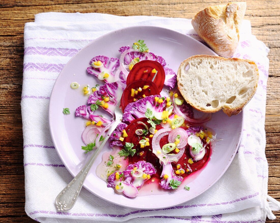 Raw purple salad with cauliflower and beetroot