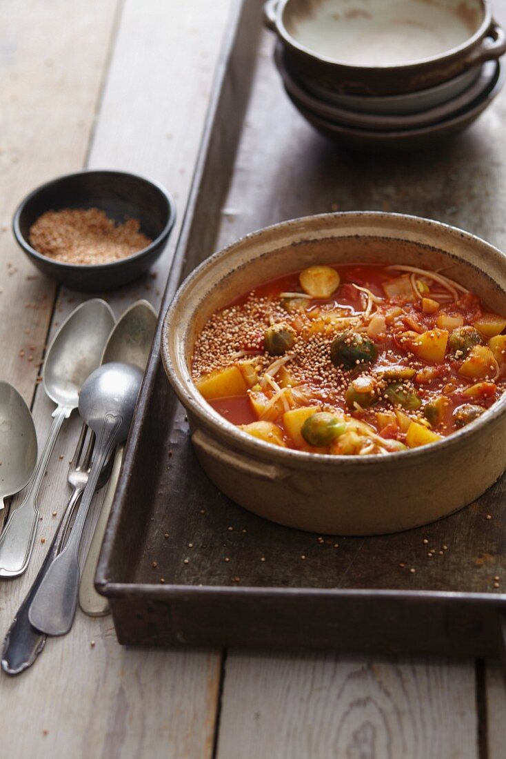 Vegan vegetable and potato goulash with quinoa