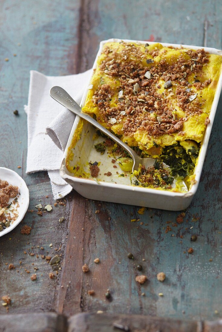 Vegetarian spinach and tofu lasagne with turmeric