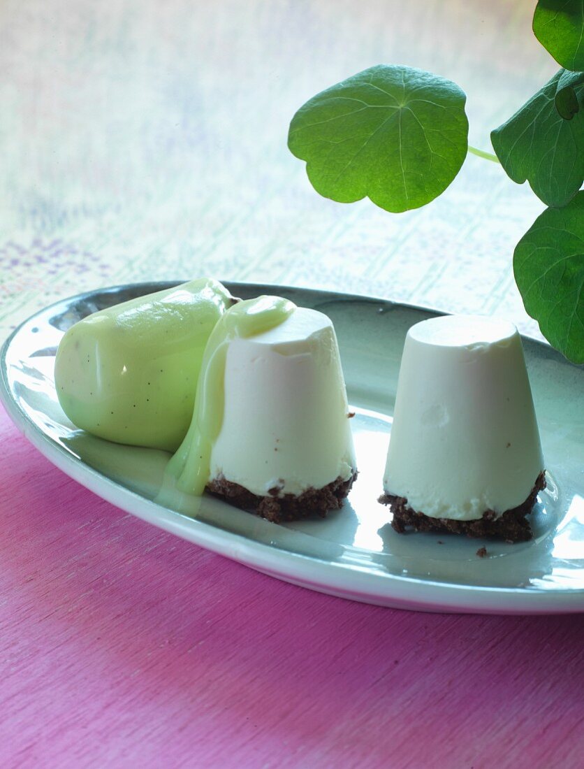 White chocolate mousse with a brownie base and watercress sauce