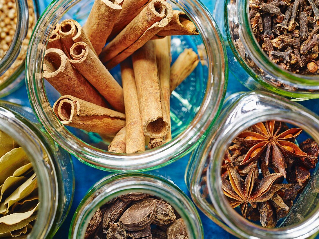 Jars of spices for hot winter drinks such as mulled wine or punch