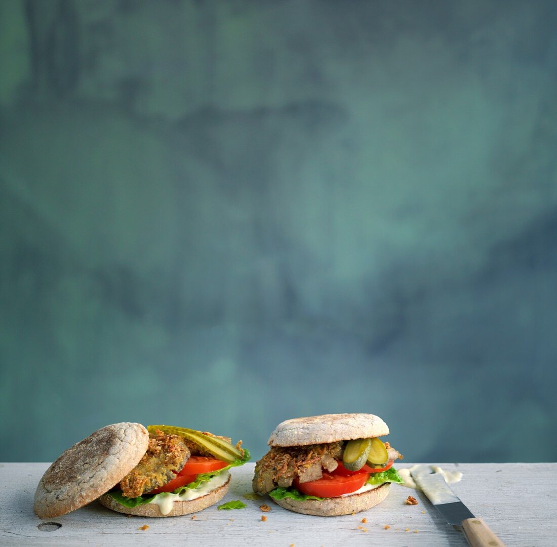 Mushroom burgers with tomatoes and gherkins