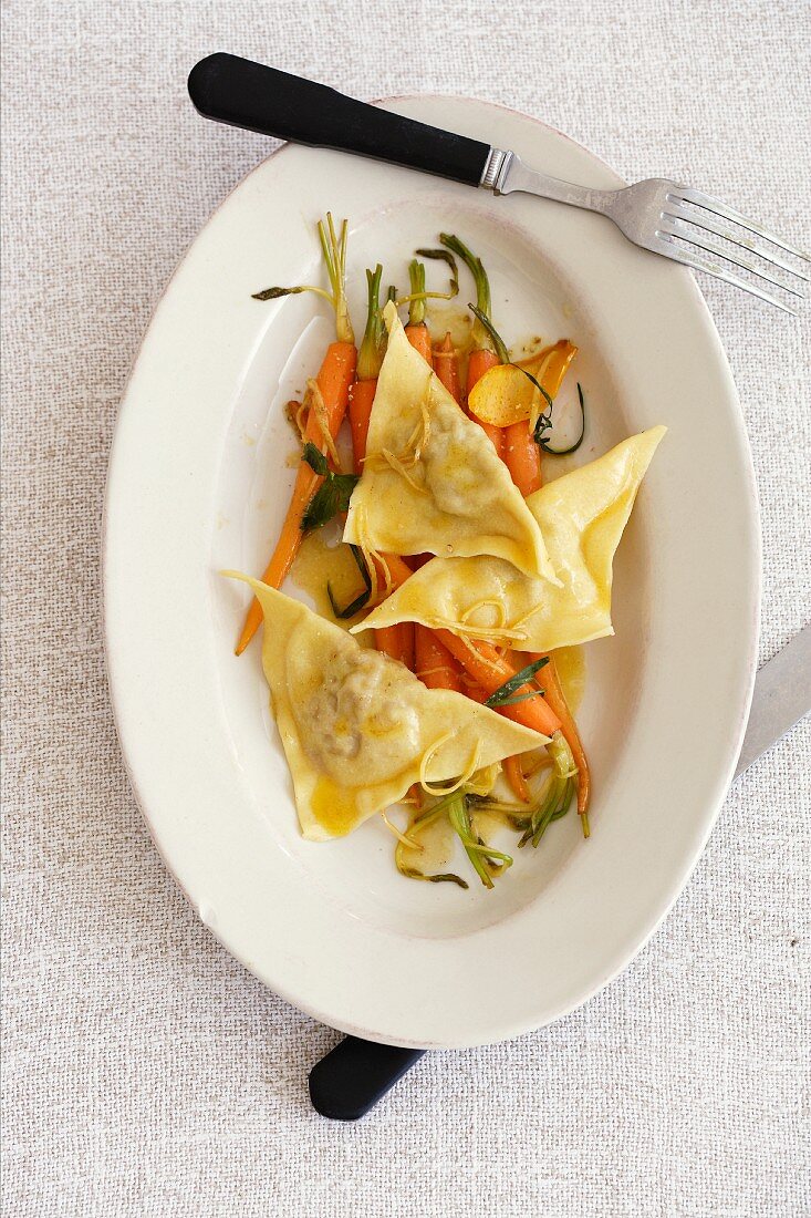 Rabbit ravioli with a carrot and ginger medley