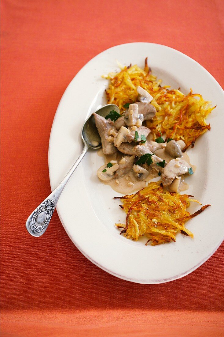 Pork with pumpkin and ginger fritters