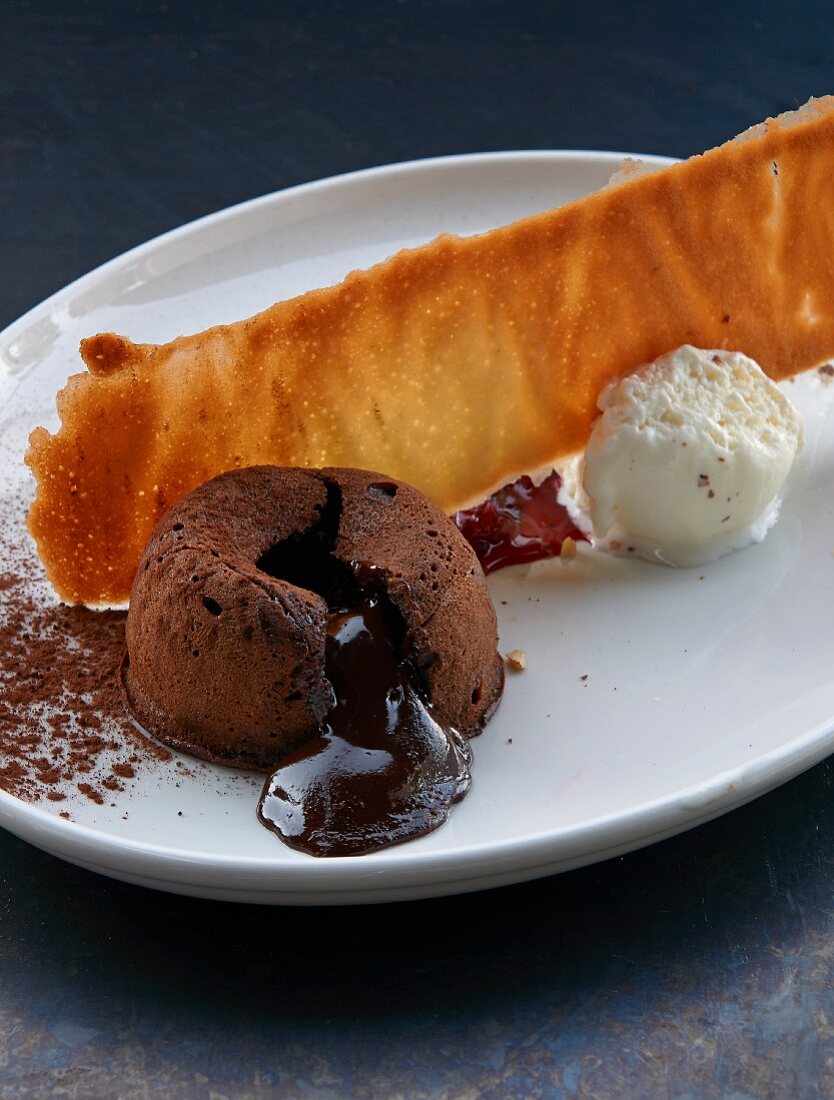 Chocolate cake with a liquid core, vanilla ice cream and a wafer