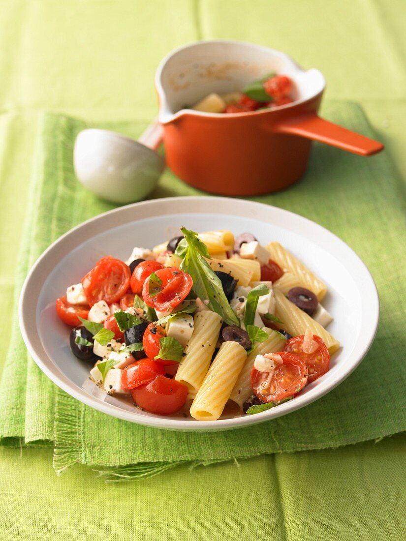 Pasta with sheep's cheese, tomatoes and olives