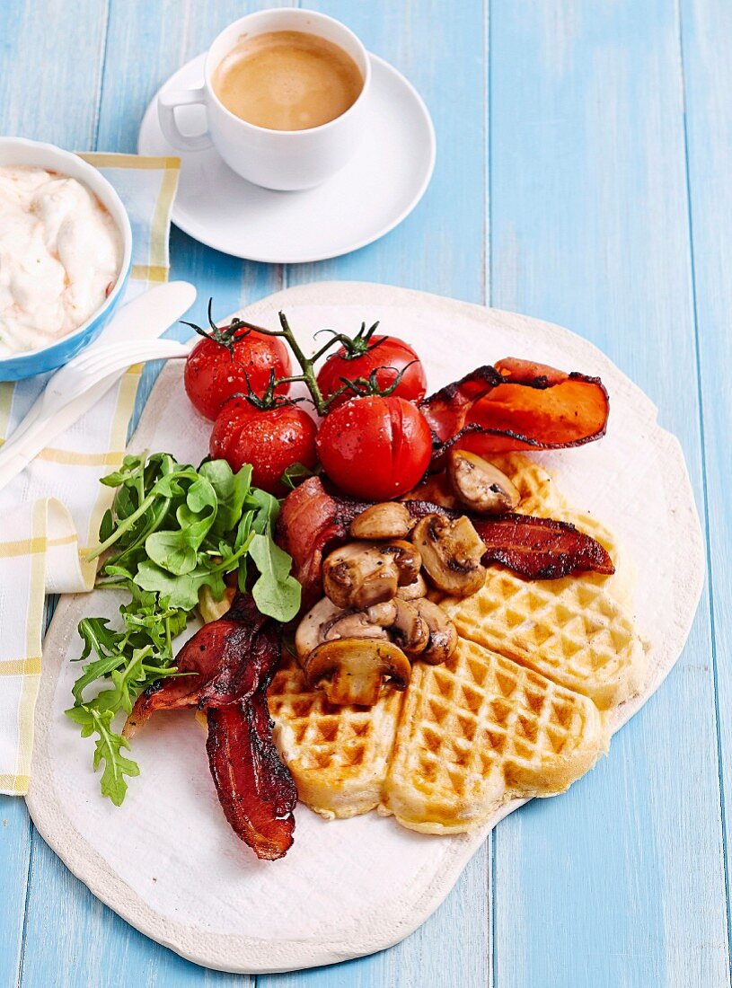 Buttermilk waffles with mushrooms, bacon and tomato