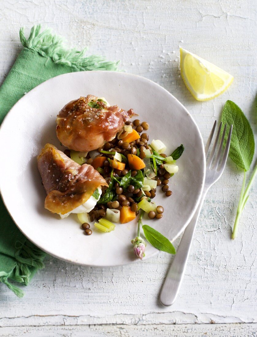 Monk fish saltimboca with a lentil medley