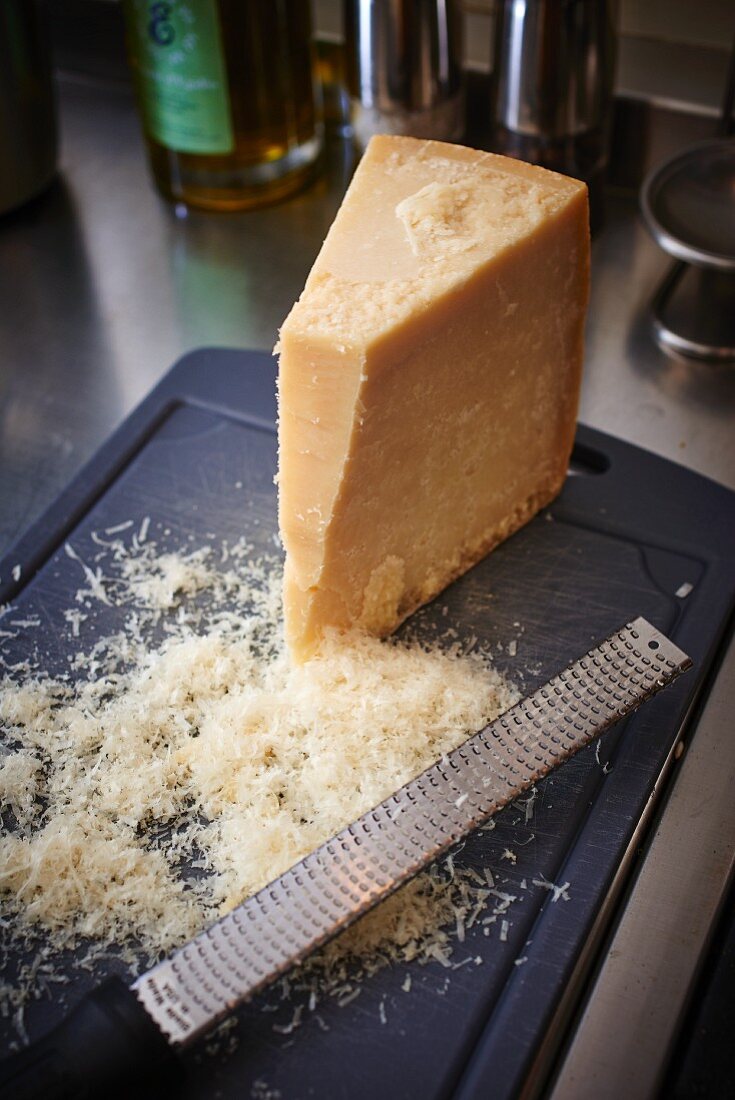 A piece of Parmesan and grated Parmesan