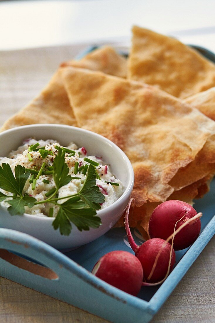 Naan bread with a radish dip