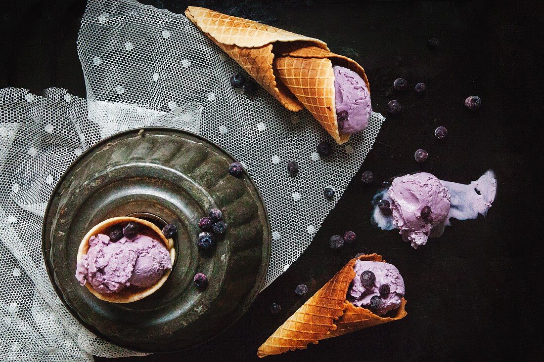 Blueberry ice cream in homemade cones