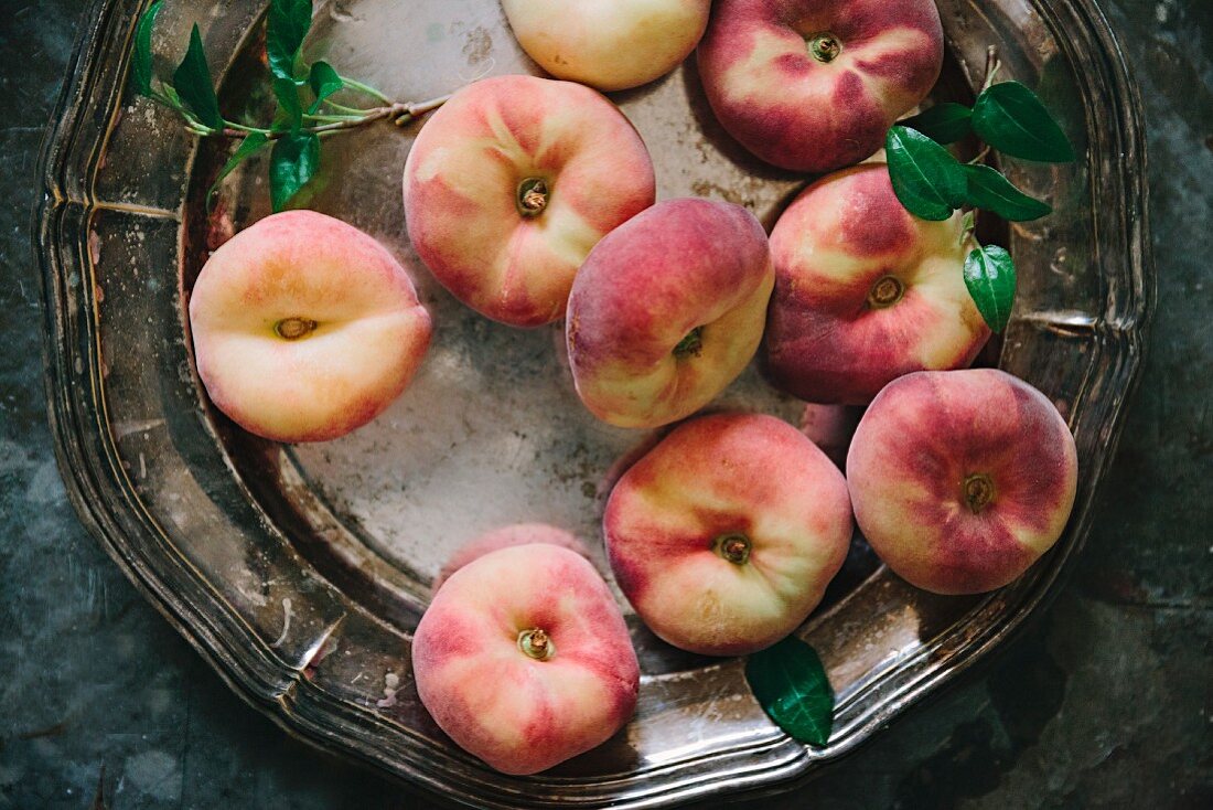 Vineyard peaches on a silver plate