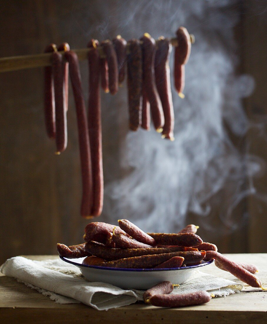 Sausages in a smoking chamber