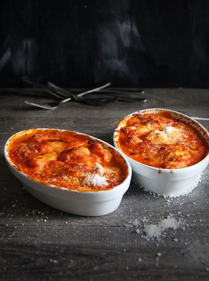 Gratinated gnocchi with tomato sauce and Parmesan cheese