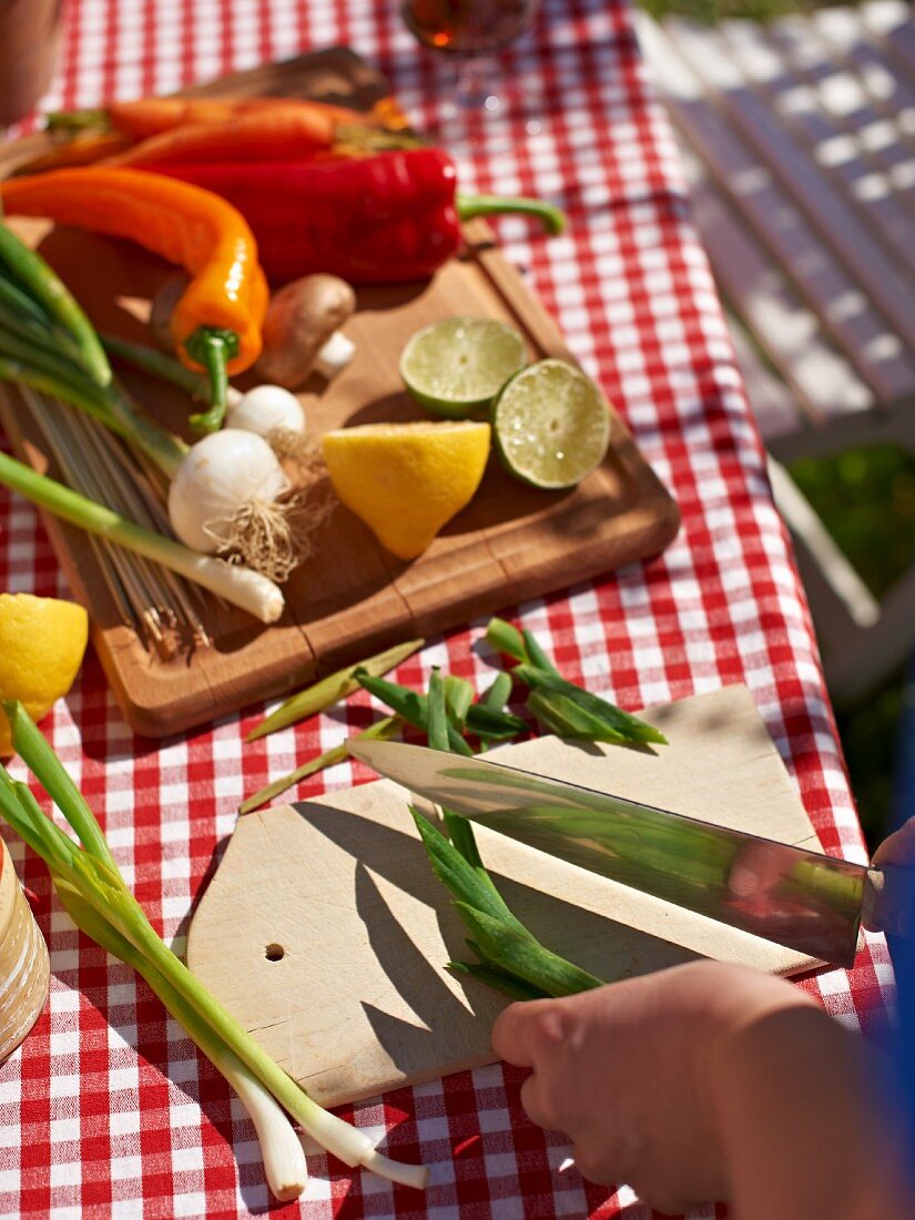 Vegetables being prepared for barbecuing