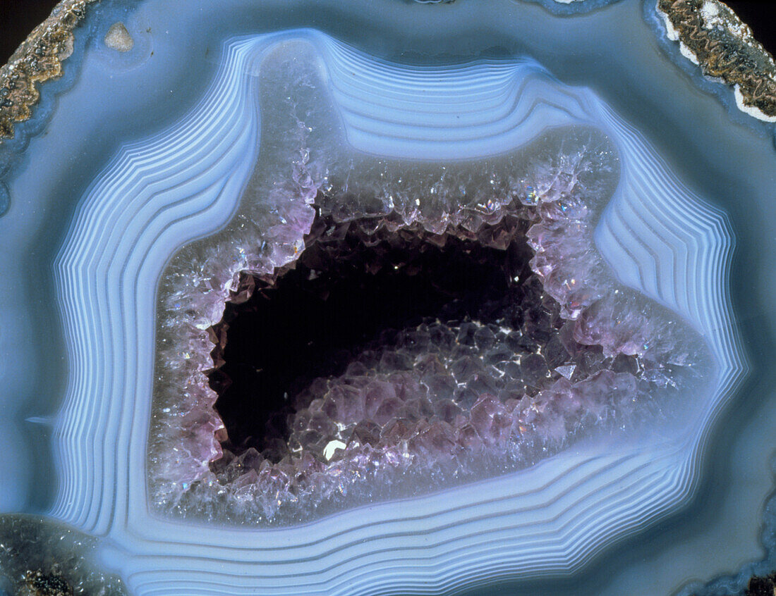 Amethyst crystals in an agate geode