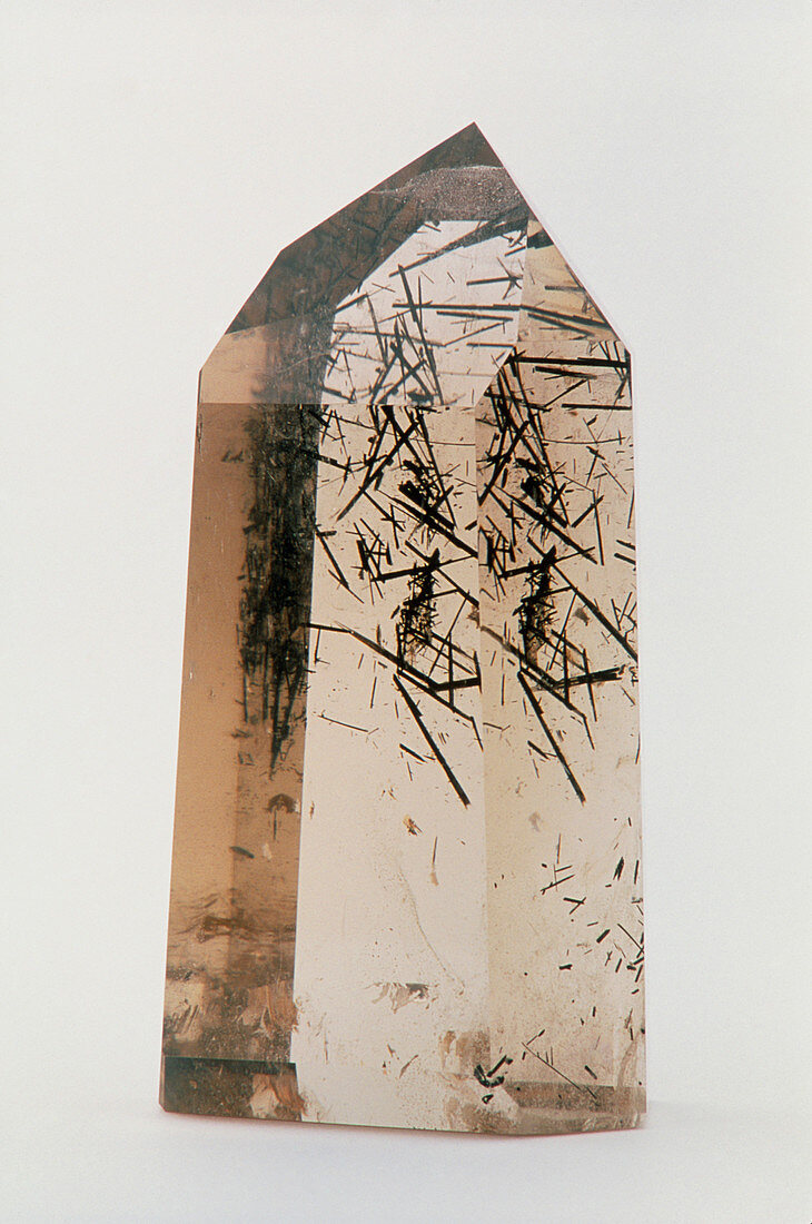 Smoky quartz crystal with tourmaline inclusions