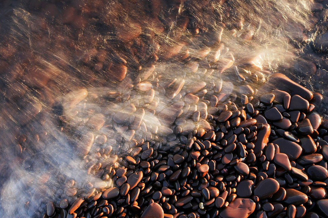 Water flowing over pebbles
