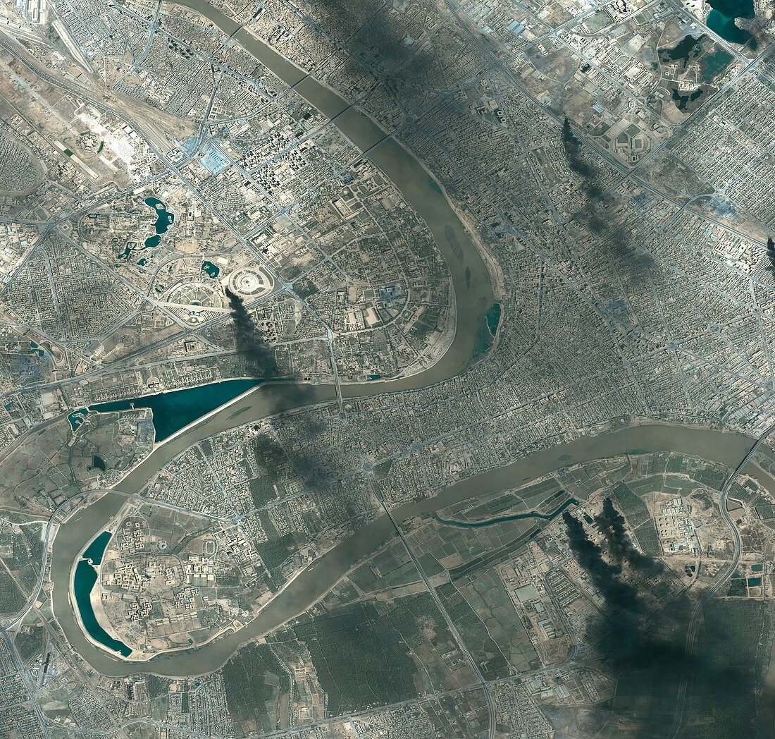 Smoke plumes over Baghdad