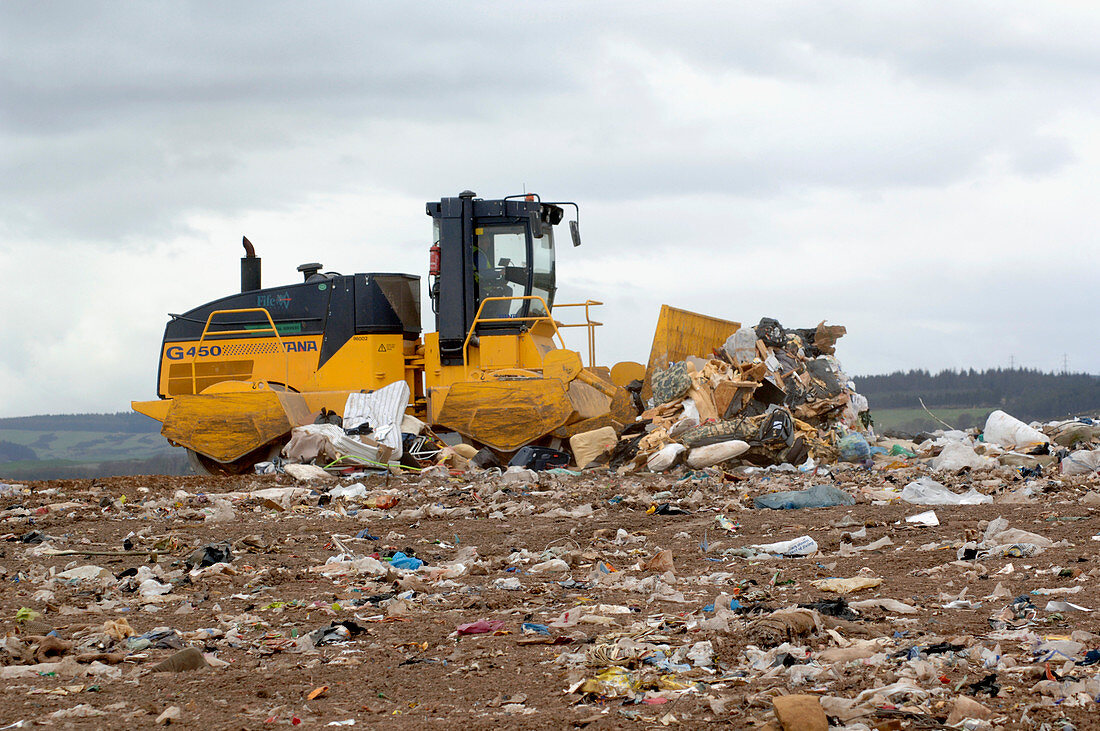 Bulldozer at a rubbish dump