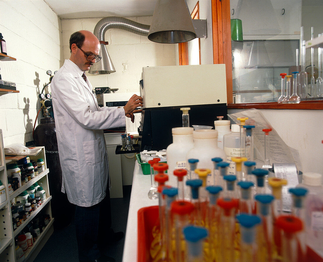 Scientist using a spectrometer