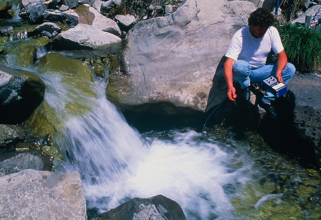 Testing the foam of a river for radiation levels