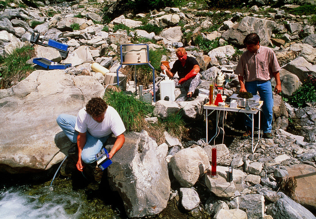 Testing the water of a river for radiation levels