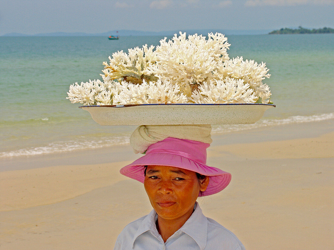 Woman selling coral