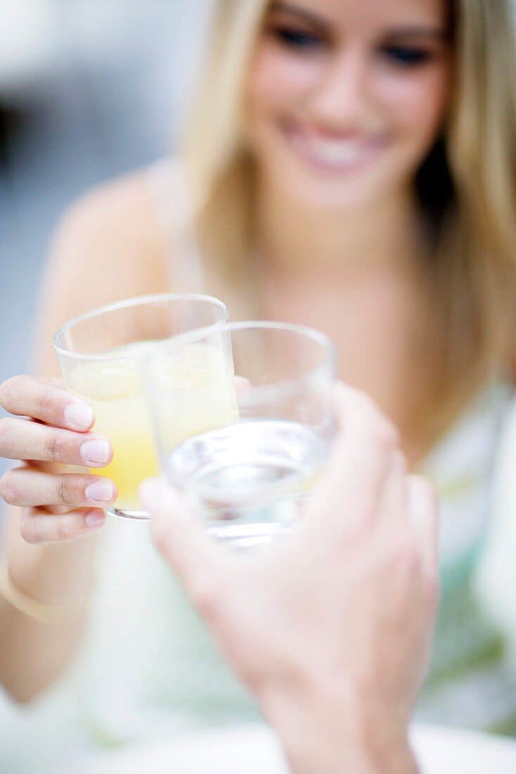 Friends toasting their drinks