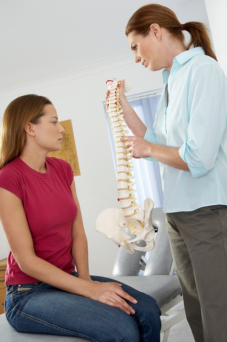 Chiropractor and patient