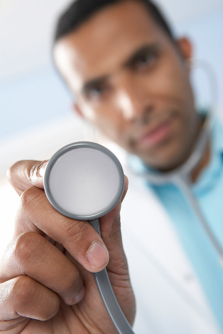 Doctor using a stethoscope