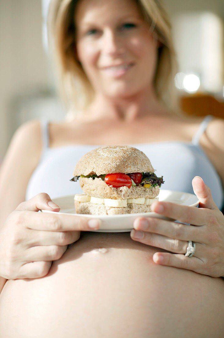 Pregnant woman eating